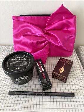 Kit w/mini makeup accessory bag, benefit Bad Girl mascara 0.1oz LUSH hand balm +
